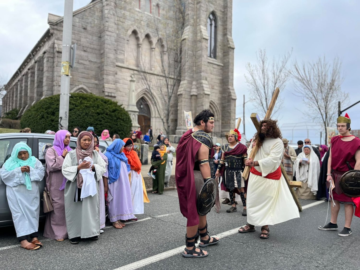 GOOD FRIDAY: Many parishes throughout the state took to the streets to bring the Stations of the Cross to life. Pictured here is Holy Ghost Church, Providence.
